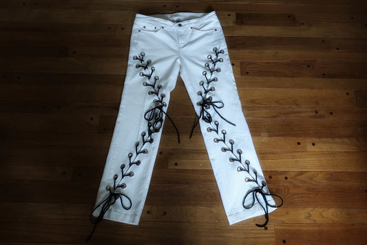 White and black lace up jeans, size Medium.